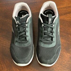 Skechers black w/ pink trim 8 1/2 go walk slip on sneakers good condition